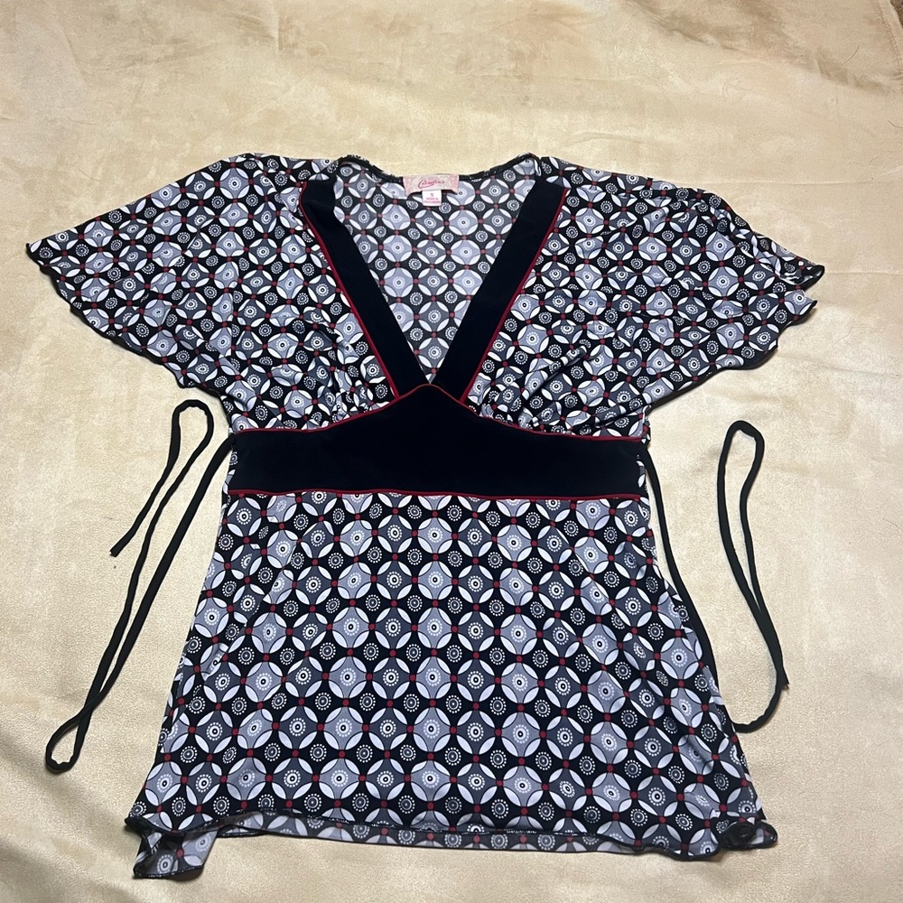 Black, white, red blouse